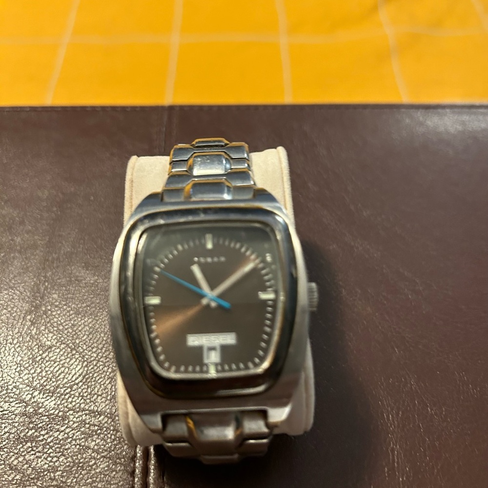 Diesel watch, silver with brown face.